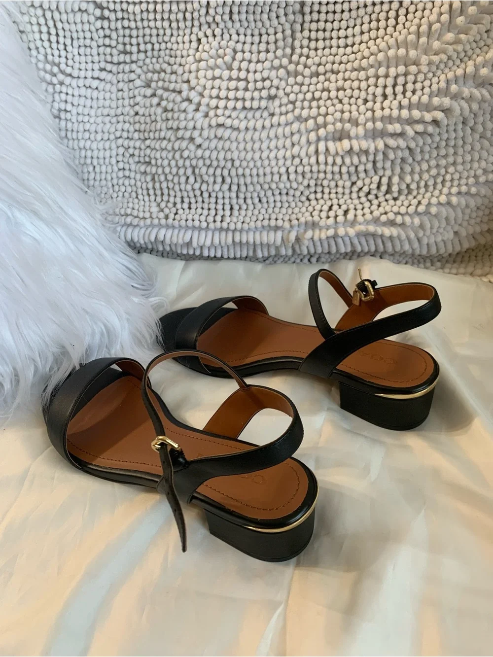 NWOT. Coach smooth leather, black sandals. Gold hardware.